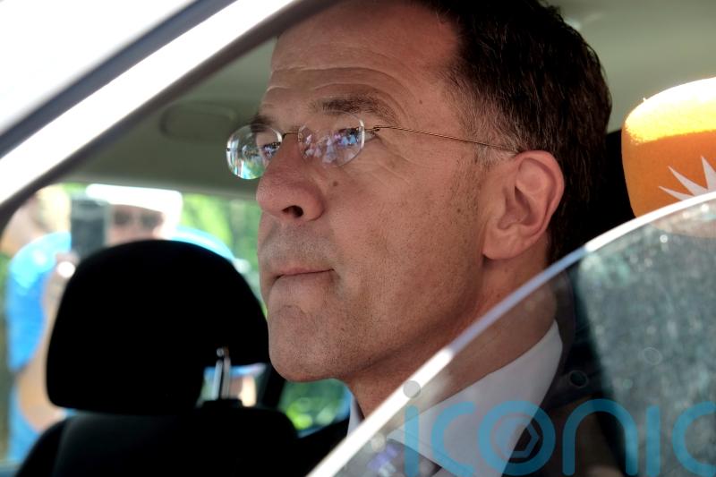Dutch PM hands in resignation to king to set stage for general election