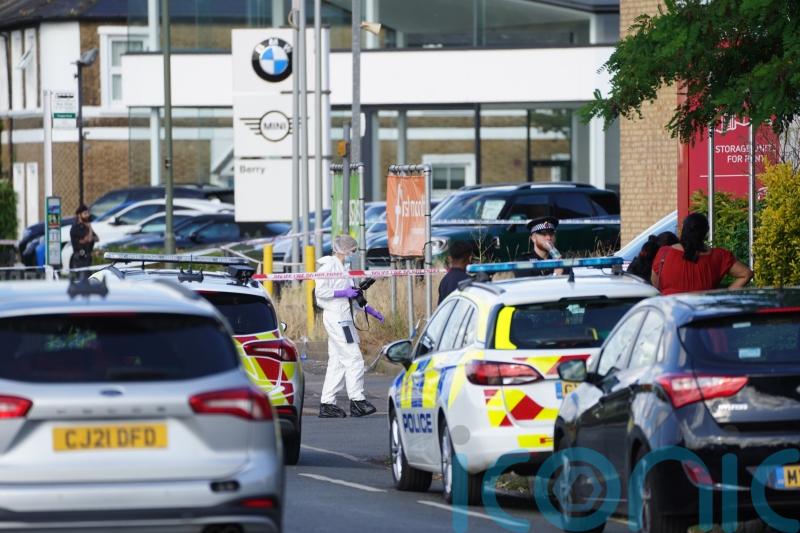 Man charged with attempted murder after two men injured in stabbings