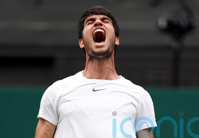 Carlos Alcaraz overcomes biggest Wimbledon test yet to reach the quarter-finals