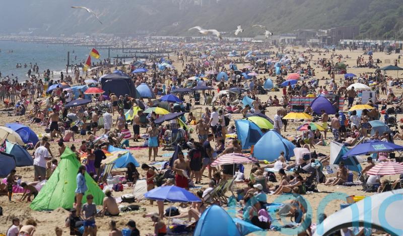 Retail sales boosted by warm June weather