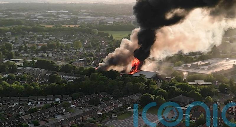 Firefighters ‘scaling down’ response after major blaze at industrial estate