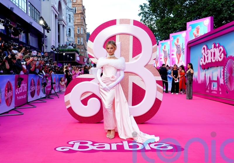 Margot Robbie channels real Barbie doll for star-studded premiere