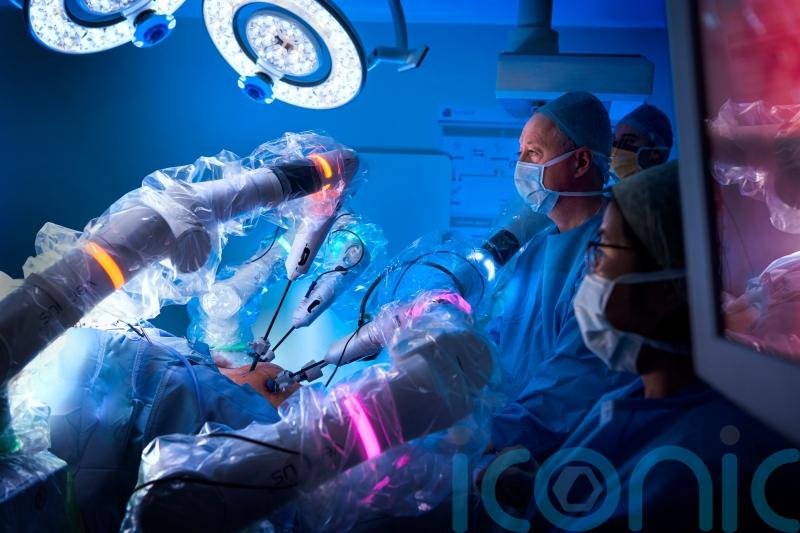 Using robots in operations could boost efficiency and free up beds, say surgeons