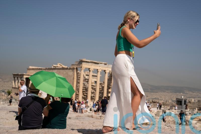 Acropolis closed to tourists temporarily as heatwave grips Greece