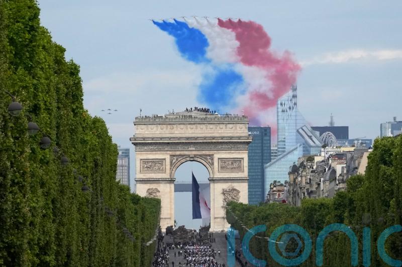France celebrates Bastille Day with extra police to prevent new unrest