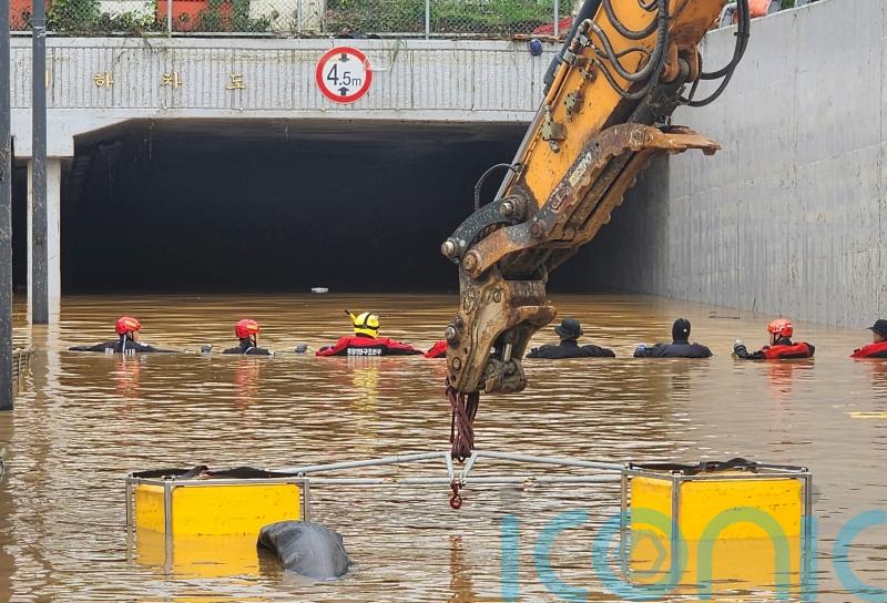 Nine bodies pulled from flooded tunnel in South Korea