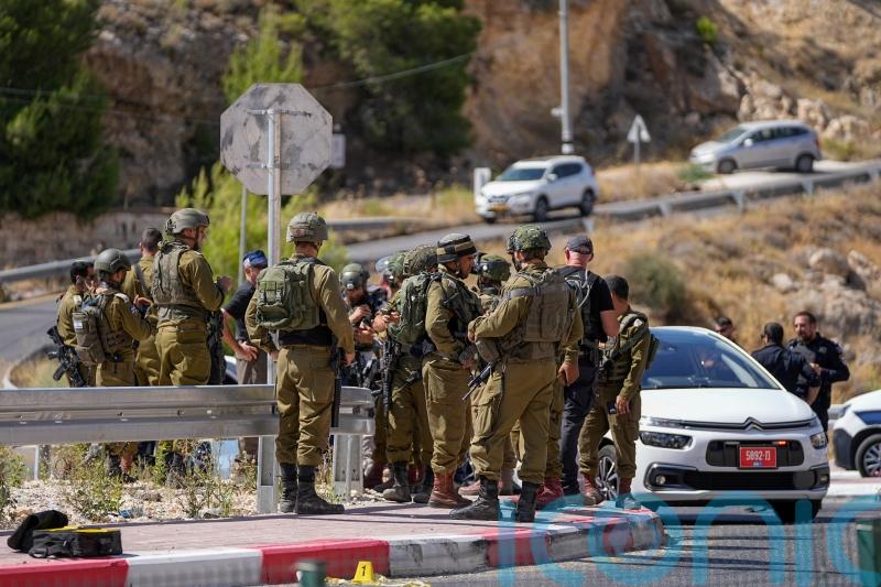 Two girls among injured after Palestinian gunman opens fire on car in West Bank