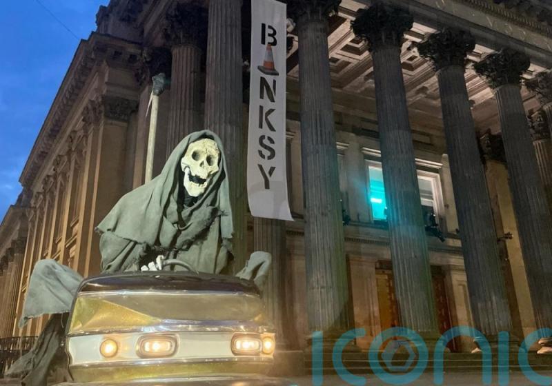 Grim Reaper to encourage late-night visitors to Banksy’s Glasgow show