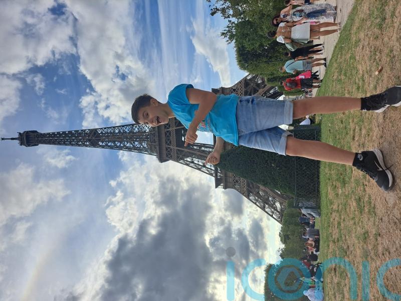 Teen who recovered from broken back completes charity Eiffel Tower climb