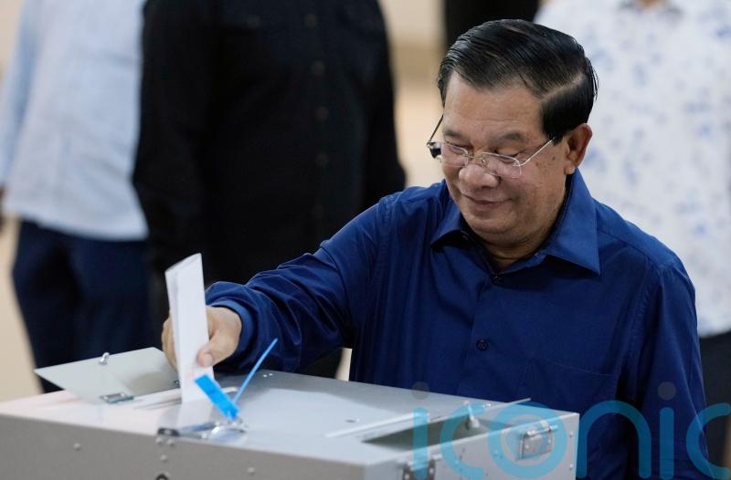 Cambodian PM’s party claims landslide election win amid suppression claims