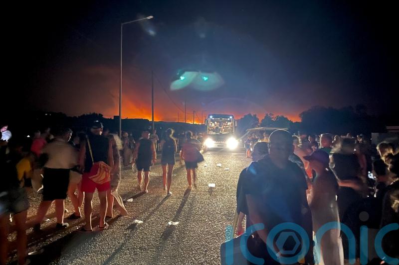 Thousands of Britons rescued from Rhodes as flights continue arriving in UK
