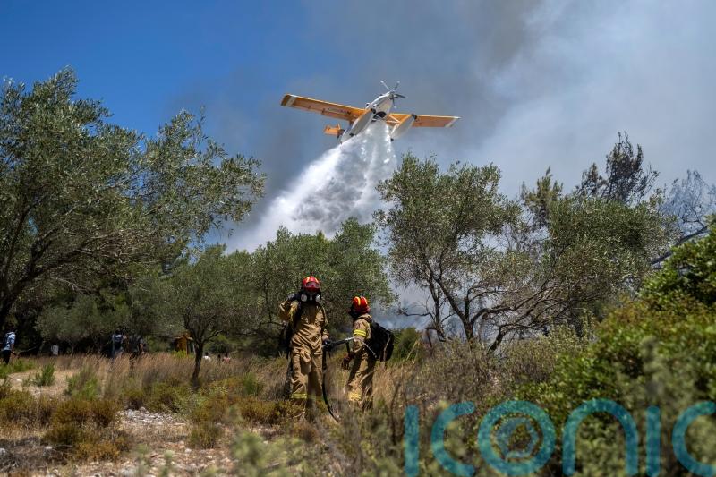 Two dead as Greek firefighting plane crashes after more evacuation orders issued