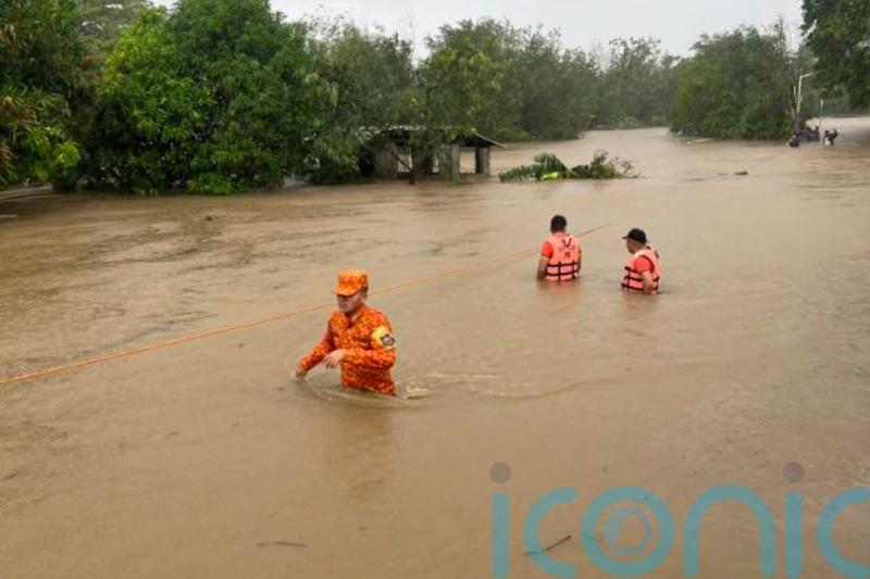 Typhoon rips off roofs, floods villages and displaces thousands in Philippines