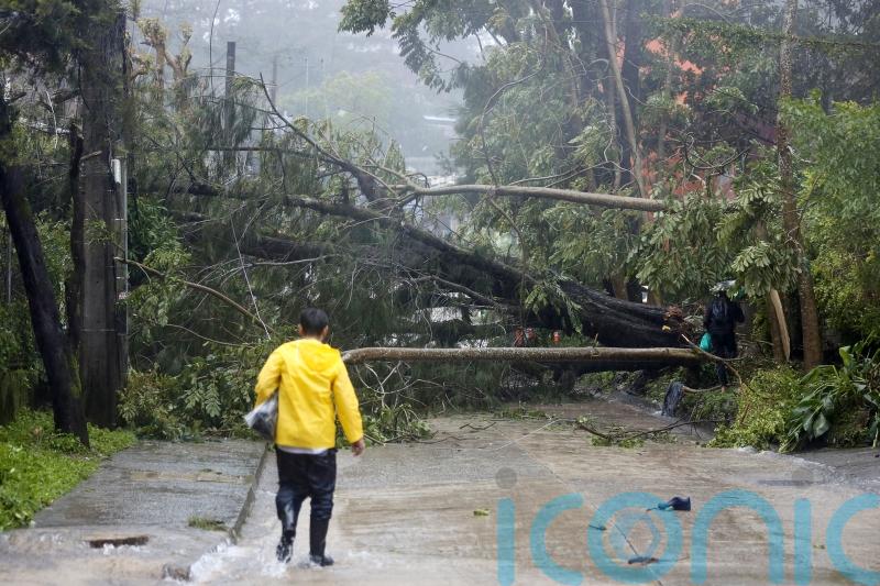 Typhoon leaves at least two dead and displaces thousands in northern Philippines
