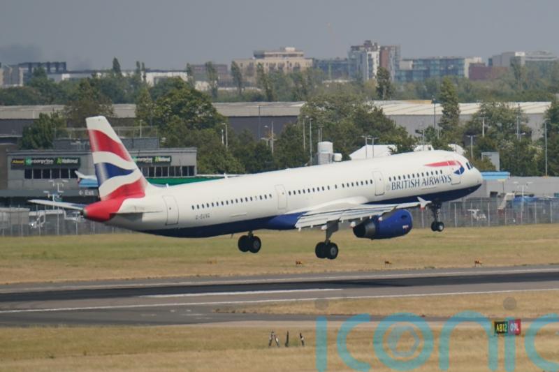 British Airways’ parent company reports record operating profit as fares soar