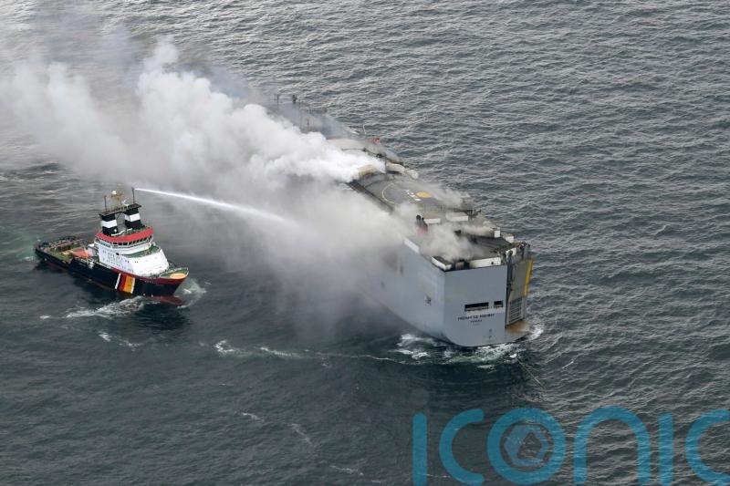 Burning cargo ship off Dutch coast will be towed to new location