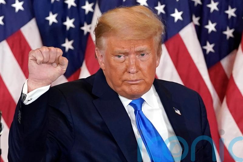 Trump charged over efforts to overturn 2020 presidential election results