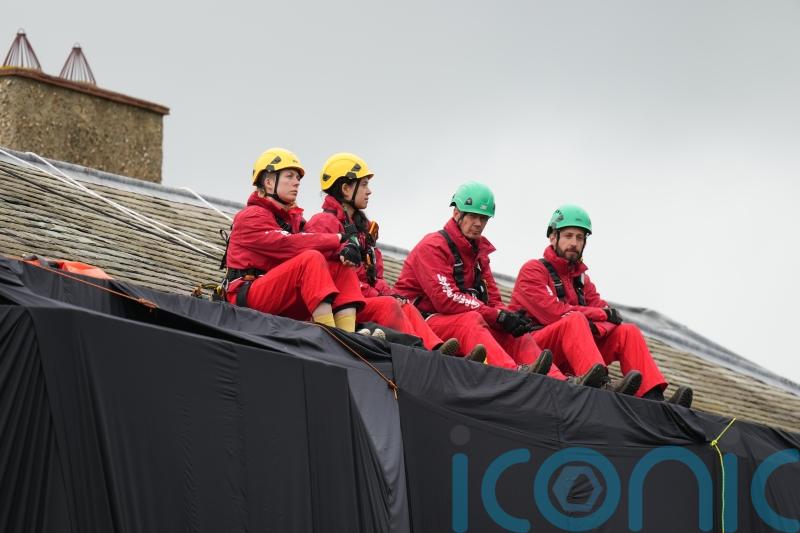 Greenpeace activists end hours-long protest against oil ‘frenzy’ on Sunak’s roof