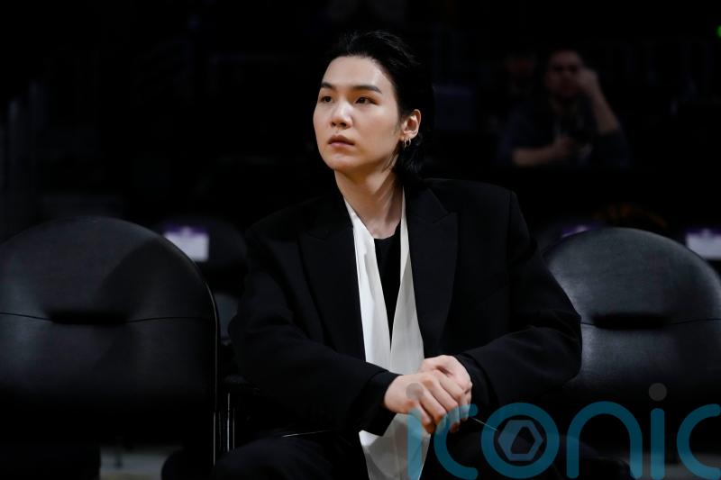 K-pop star Suga becomes third BTS member to begin military service