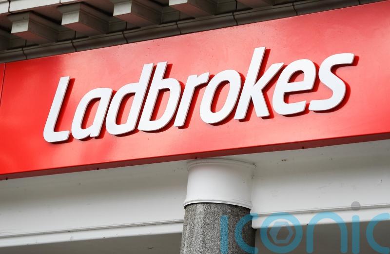 Entain sets aside £585m for possible penalties after bribery investigation