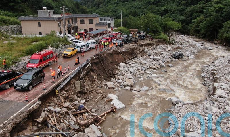 China residents evacuated from homes amid search for more mudslide victims