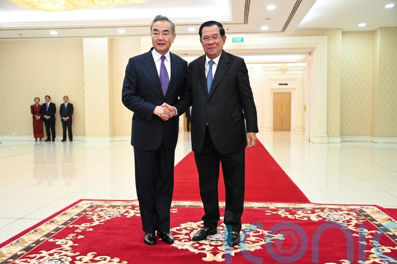 China’s foreign minister visits Cambodia days after premier hands role to son