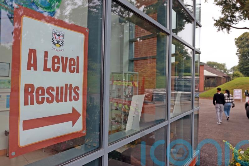 Top A-level results fall in return to pre-pandemic grading system