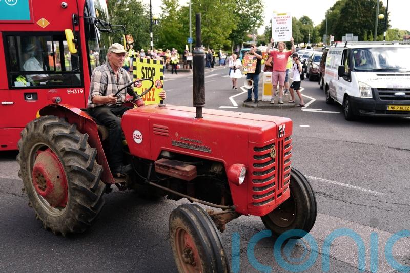 Ulez protest featuring tractors and three-wheel car brings traffic to standstill