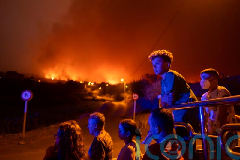 Major wildfires burn in Greece and Tenerife