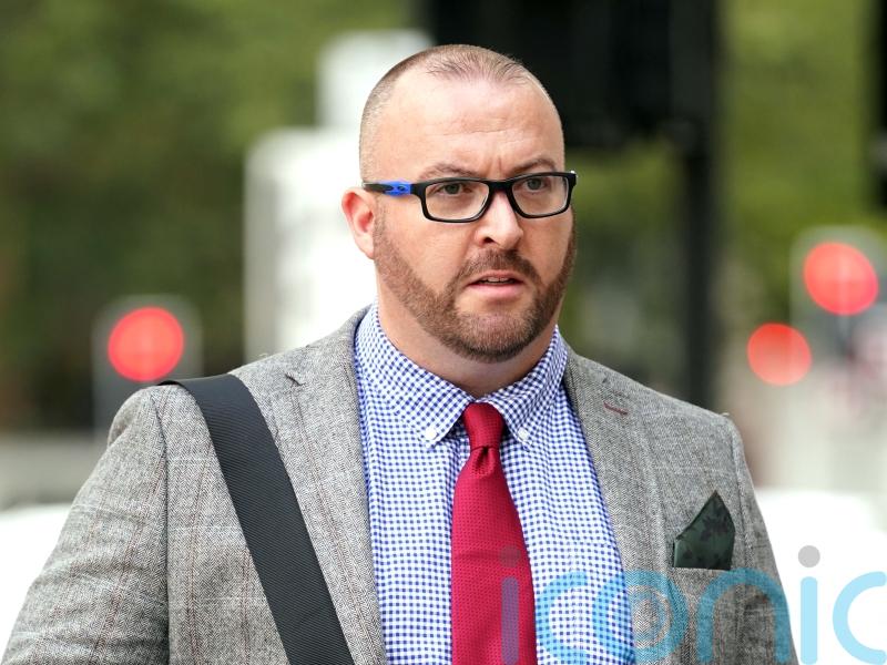 Police officer denies punching and choking teenage boy at London Tube station