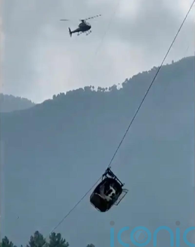 First two children rescued from cable car hundreds of feet above Pakistan canyon