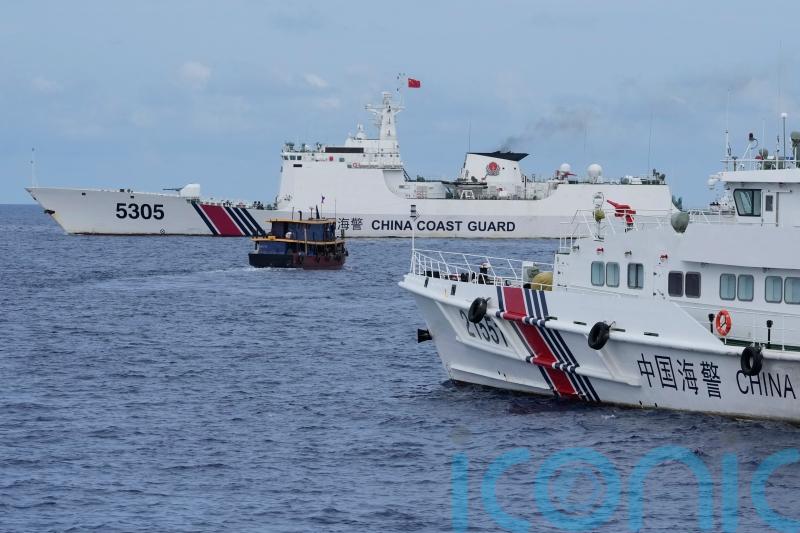 Philippine supply boats breach Chinese coast guard blockade in South China Sea