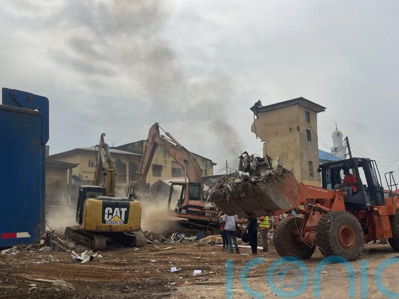 Two dead and many feared trapped as building collapses in Nigeria’s capital