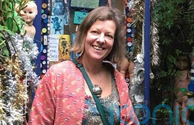 Man arrested on suspicion of murder amid search for missing woman