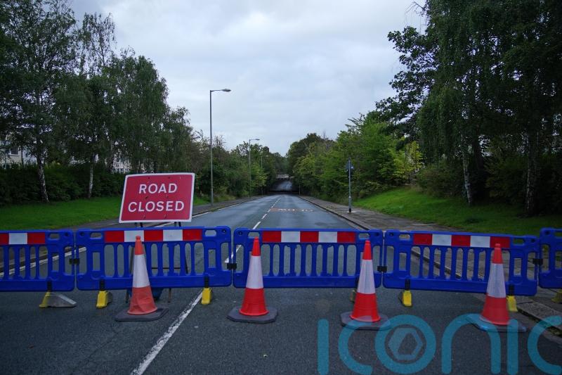 Mossley Hill road remains shut as two people die after driving into flooded area