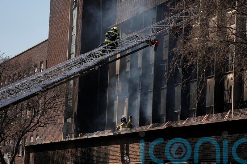 At least 74 dead as fire rips through rundown building in South Africa