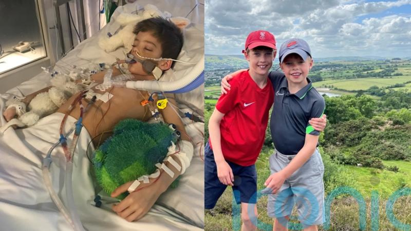 Nine-year-old who went from cross country race to open-heart surgery raises £10k to thank charities