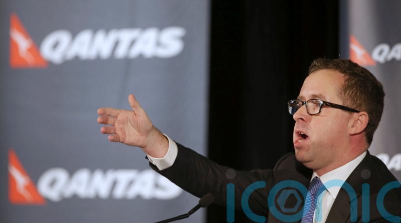 Qantas boss quits after ticket-selling scandal
