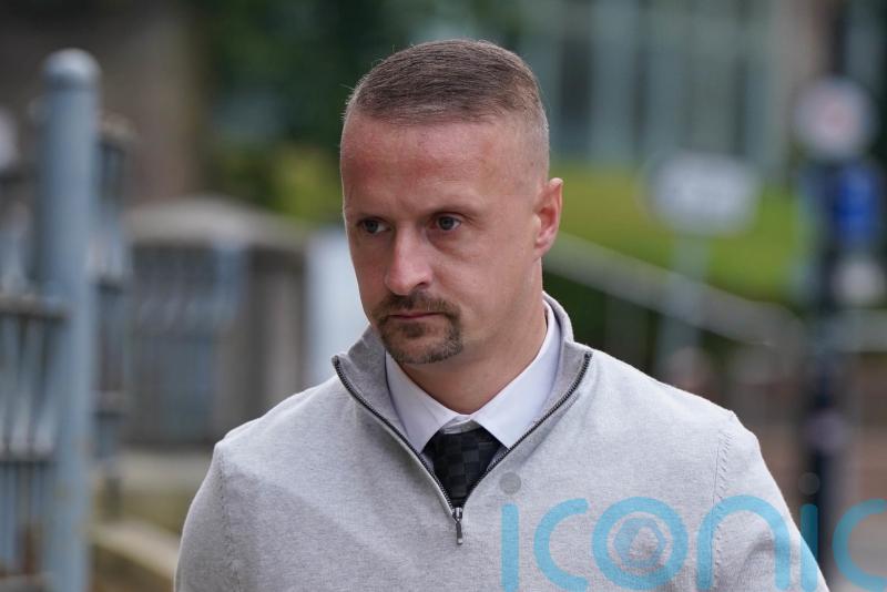 Footballer Leigh Griffiths fined for kicking flare into crowd