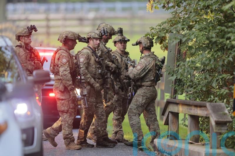 Murderer escaped by scaling wall topped with razor wire, says US prison official