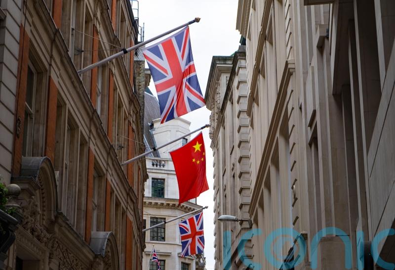 Parliamentary researcher ‘who spied for China’ is arrested