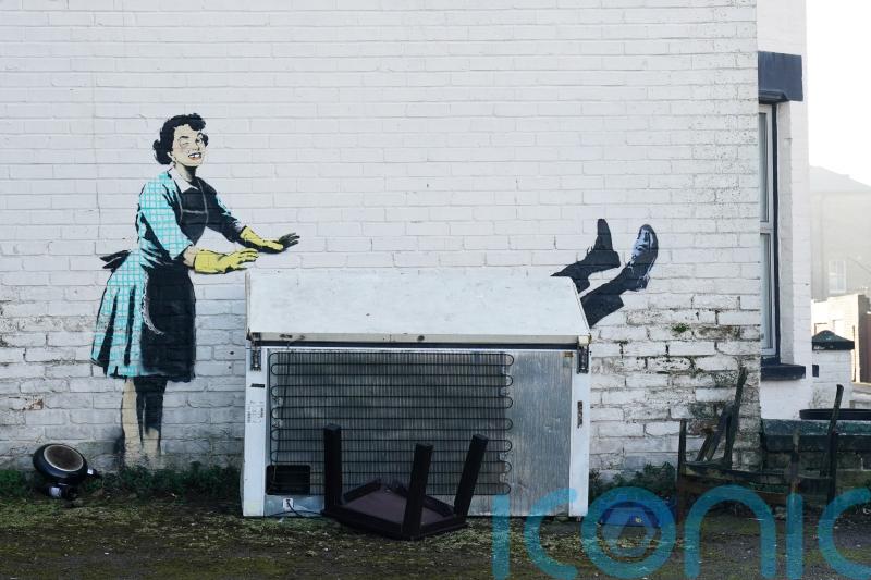 £6m Banksy mural lifted by crane into new London exhibition