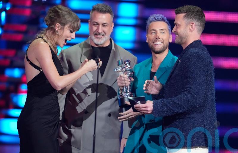 Taylor Swift questions NSYNC on future plans after awards reunion