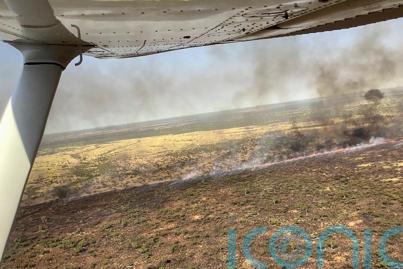 Australian authorities working to protect Outback town against huge wildfire