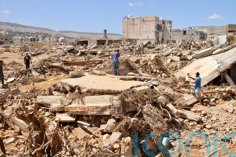 Libya buries thousands after deadly floods as search teams look for survivors