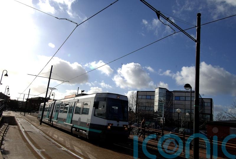 Four face charges over restraint death on Manchester tram system