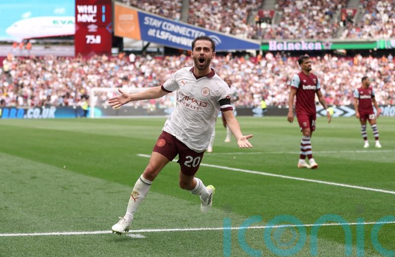 Late Bernardo Silva and Erling Haaland goals keep Manchester City top
