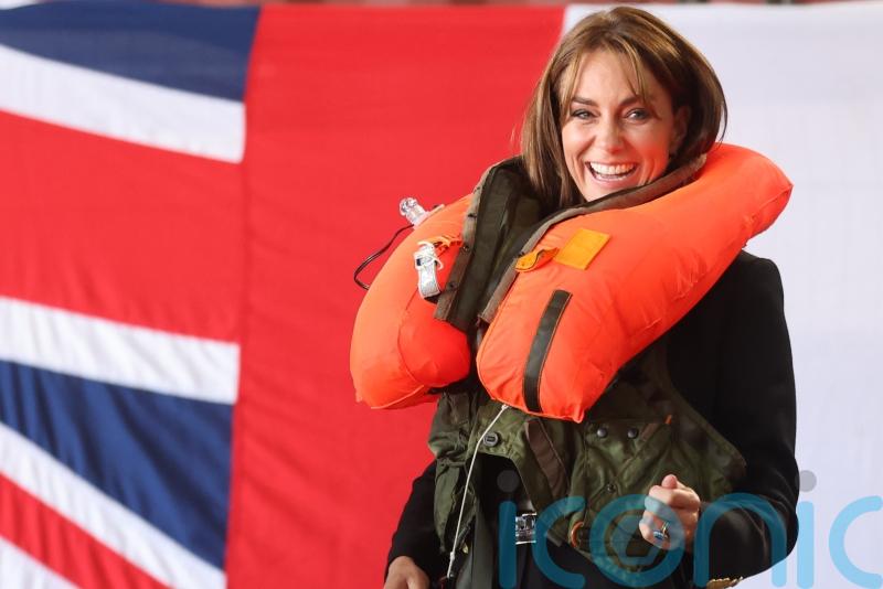 Kate surprised by inflating lifejacket during Royal Navy air base visit