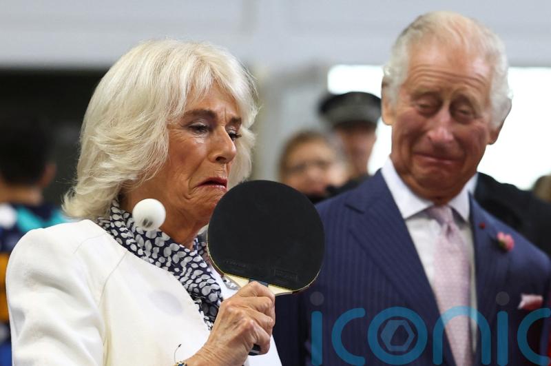 Queen takes on French president’s wife in game of table tennis