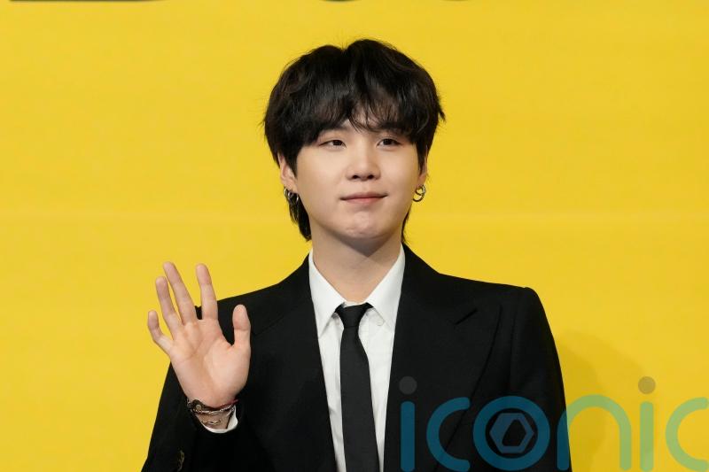 Suga from BTS begins mandatory military duty in South Korea